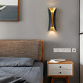 Up down wall light mounted on a bedroom wall