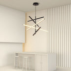 Iron linear chandelier in a beige room with white furniture