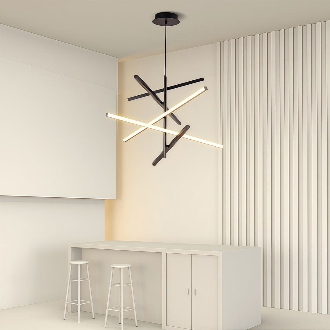 Iron linear chandelier in a beige room with white furniture