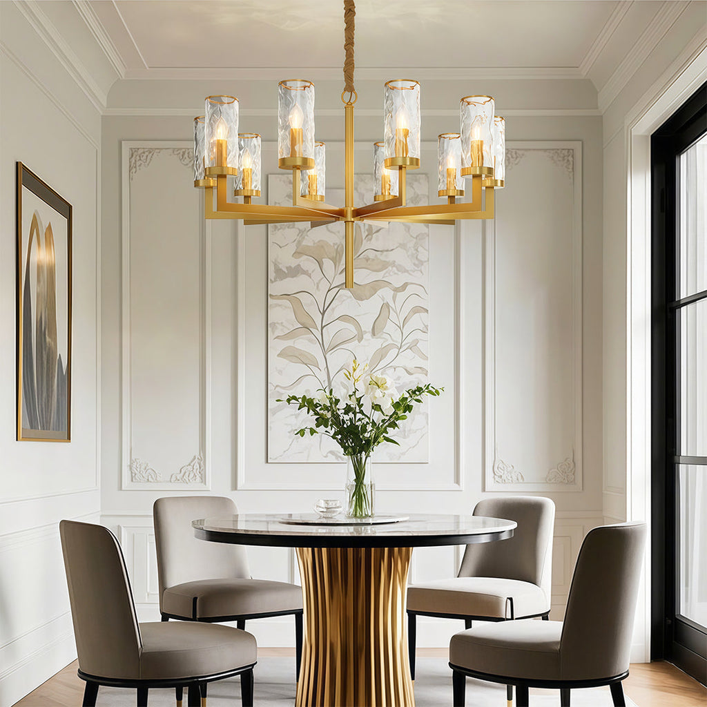 Island chandelier in a panelled room beside artwork