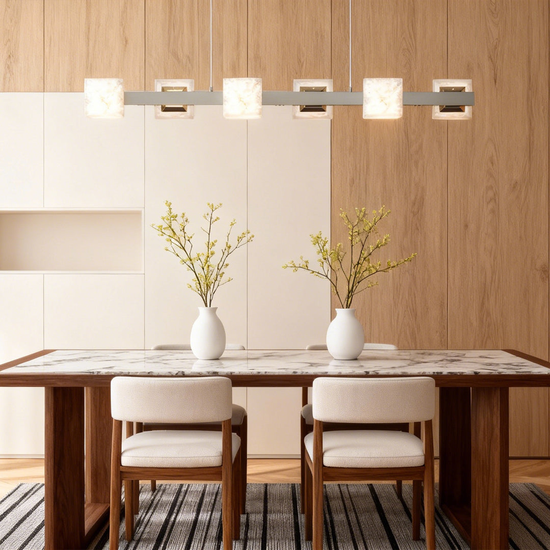 Cloud stone chandelier above a dining room table