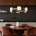 Cloud stone kitchen island chandelier hanging in a dining room