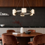Cloud stone kitchen island chandelier hanging in a dining room