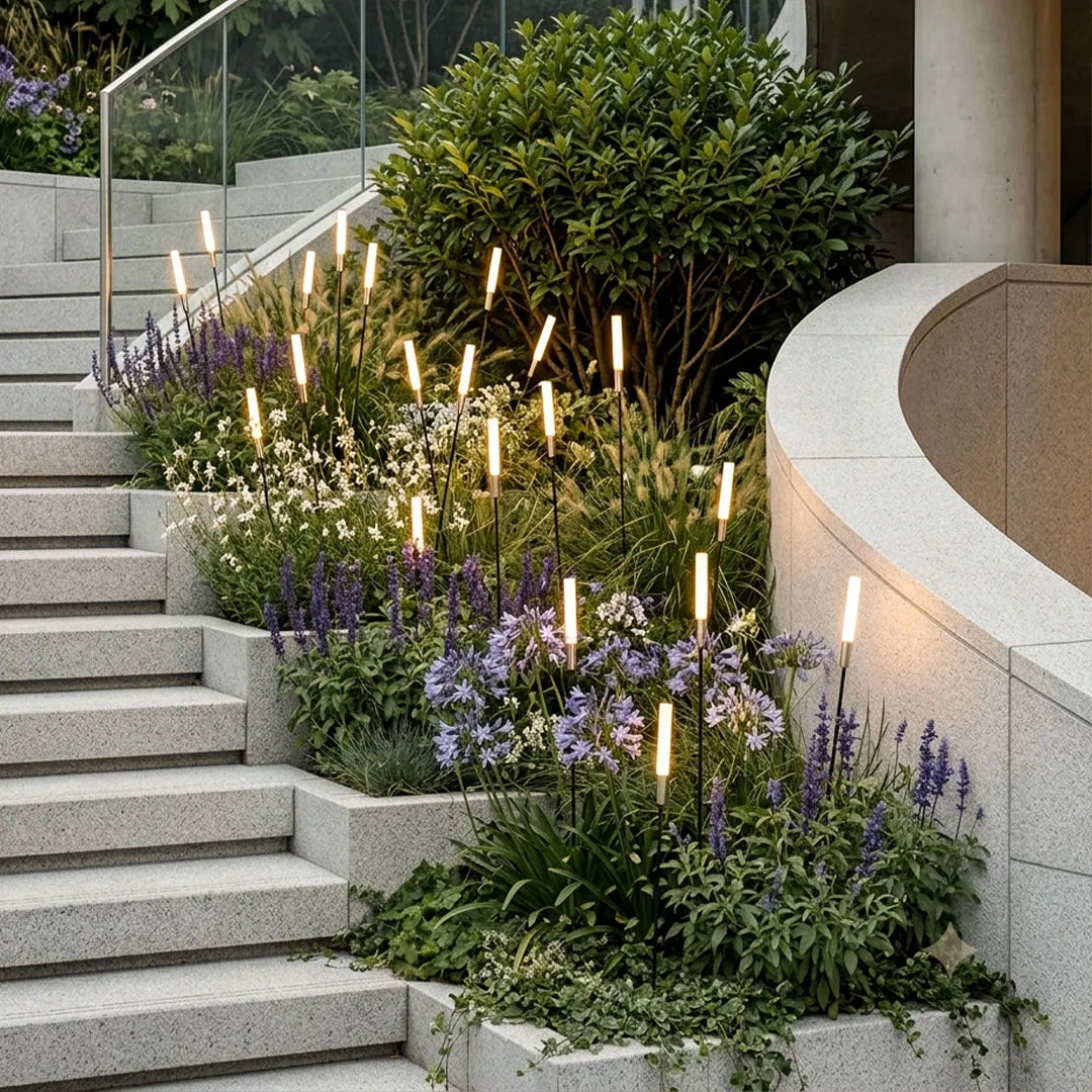 Spike lights lining a set of stone garden steps