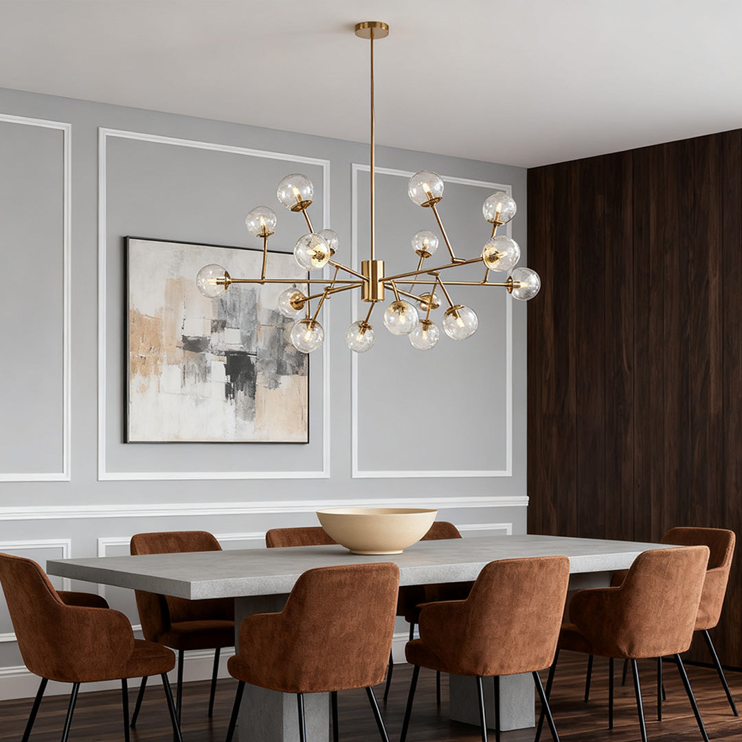 Frosted globe chandelier in a dining room beside a window