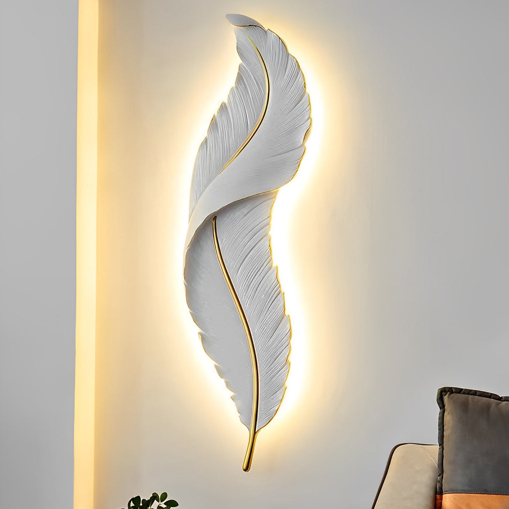 Large white feather wall light on a minimalist plain wall