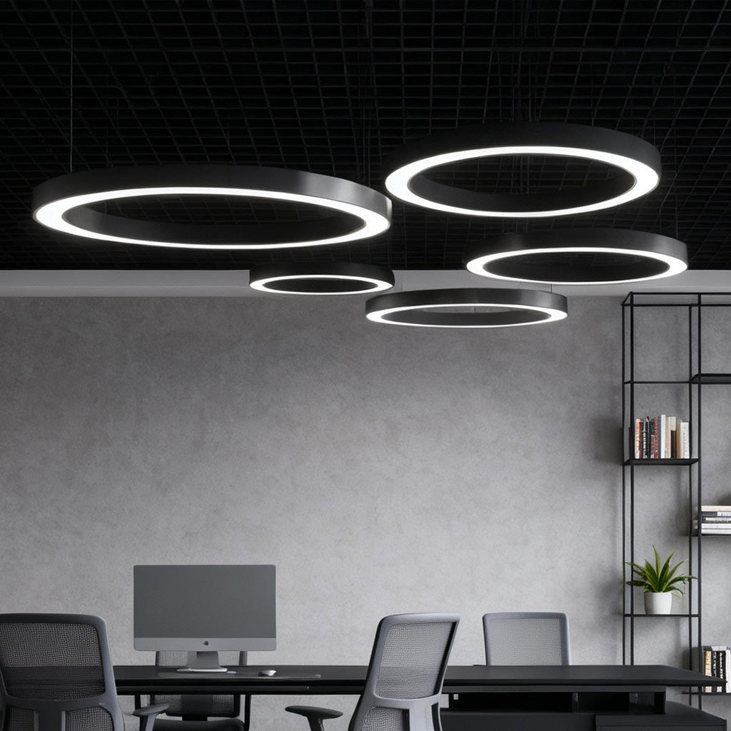 Sleek LED ring pendant light above a contemporary dining table