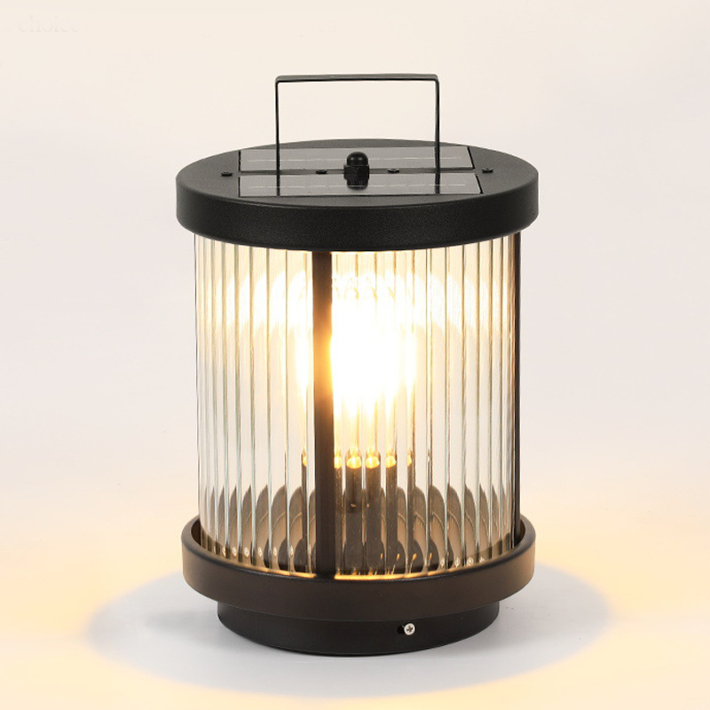 Solar lantern on a grassy lawn beside outdoor seating