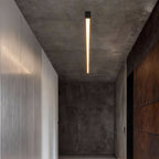 Linear LED ceiling light installed along a hallway ceiling