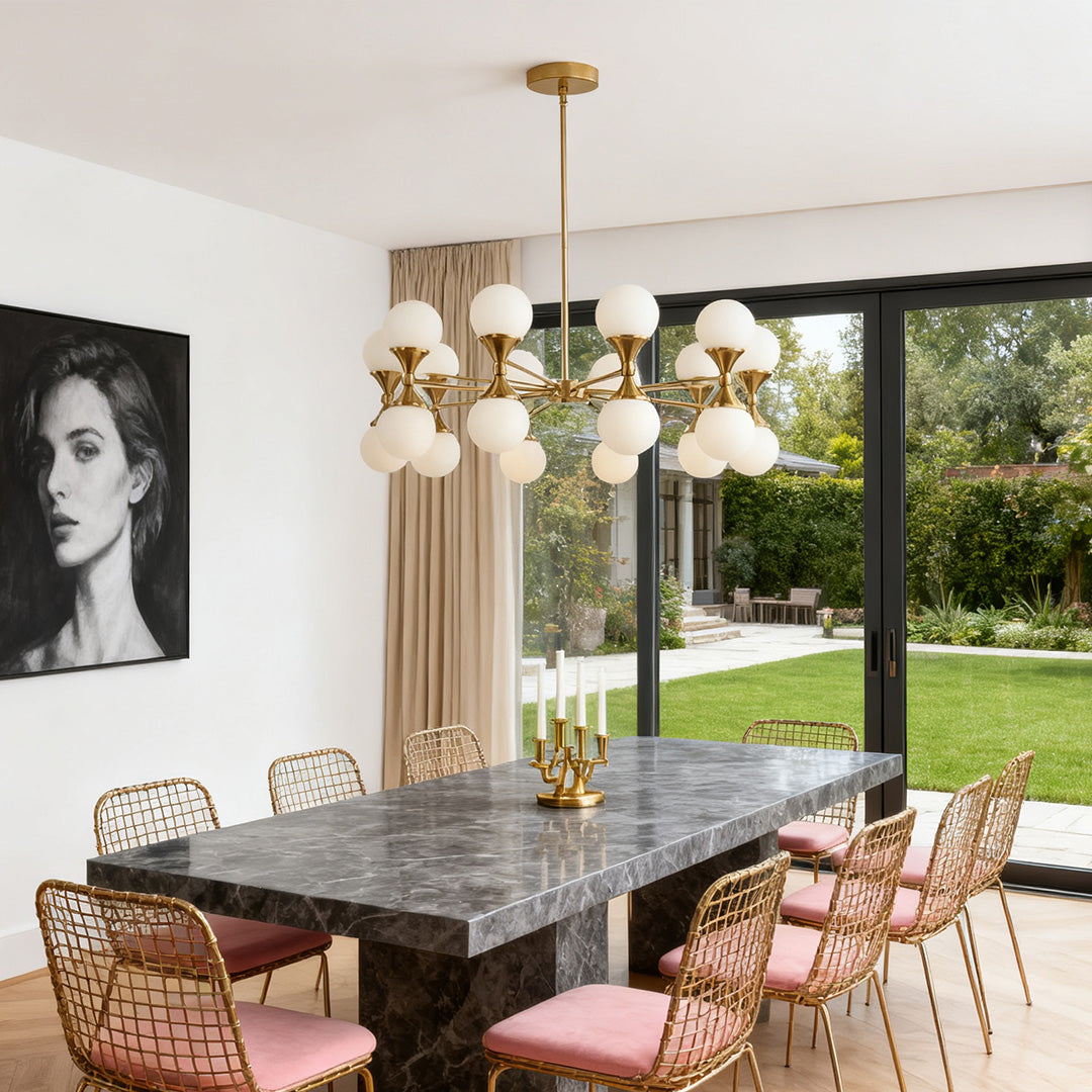 Linear chrome chandelier with clear crystal orbs in a dining room