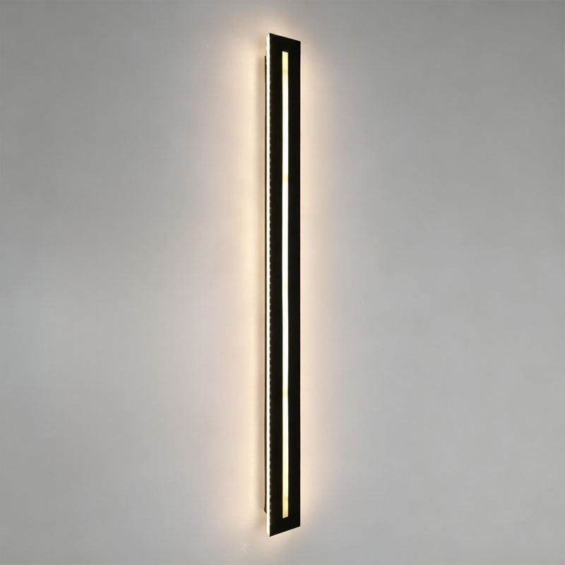 Long black wall sconce shown from its slim side profile