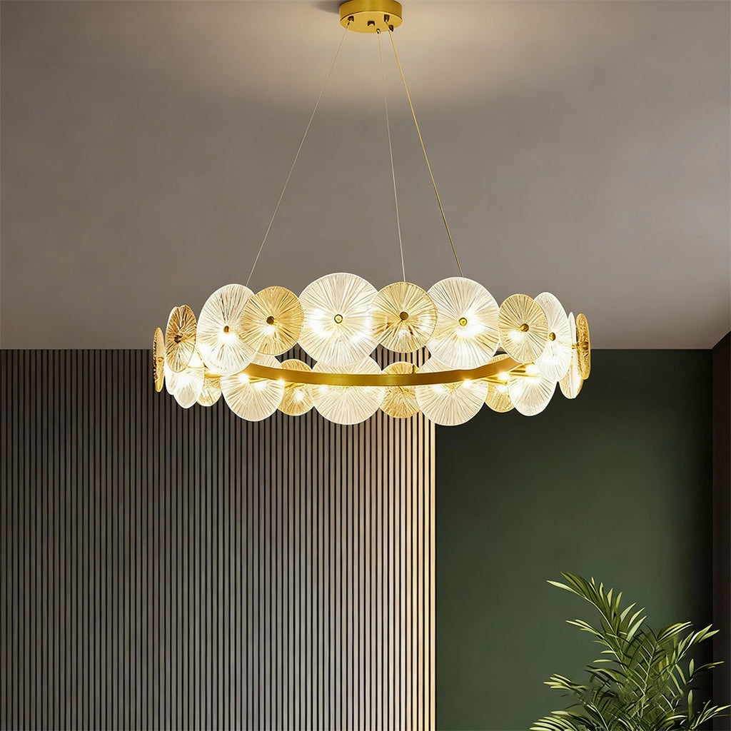 Large glass chandelier hanging in a luxurious bedroom