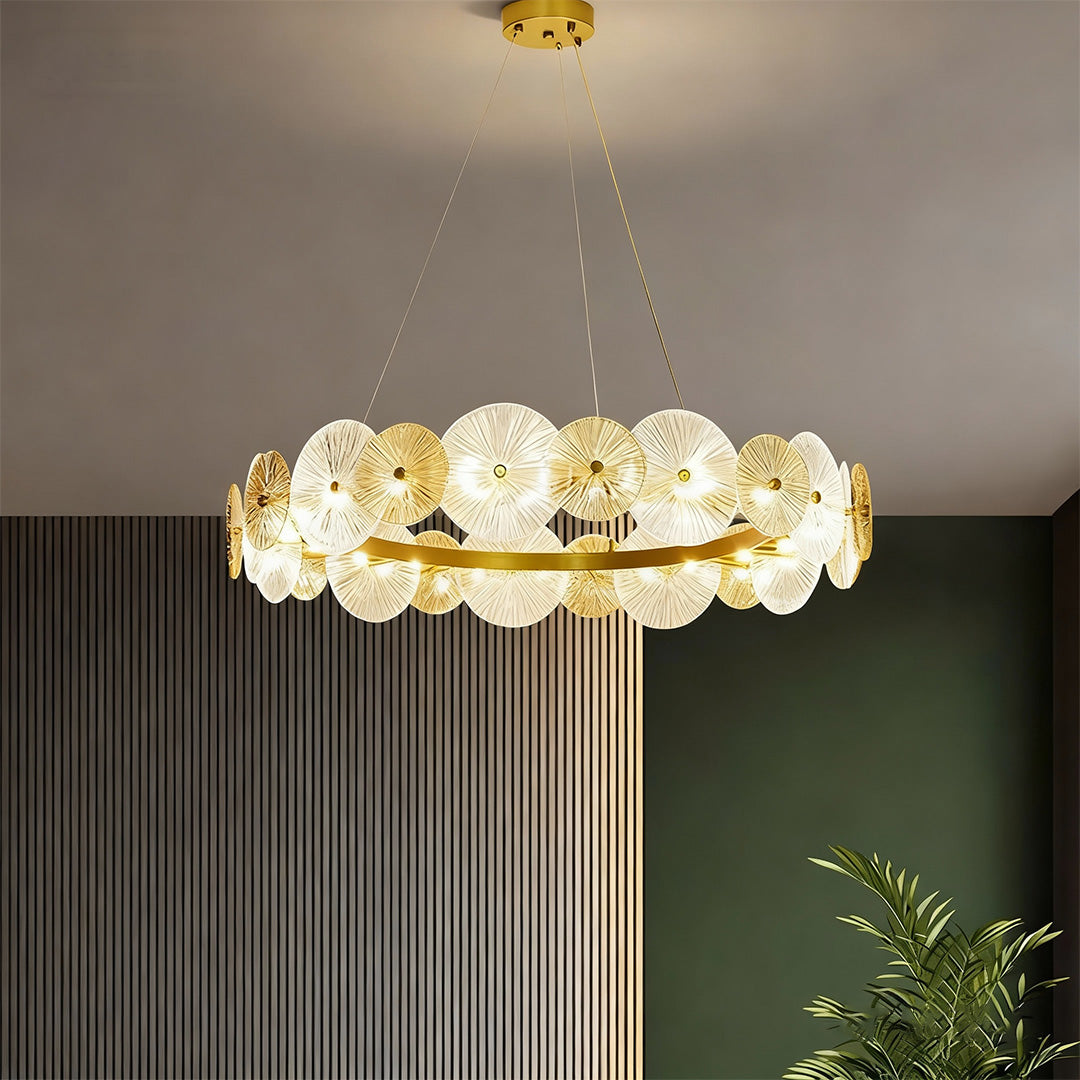 Large glass chandelier hanging in a luxurious bedroom