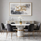 Gold frame chandelier with clear crystal above a marble table