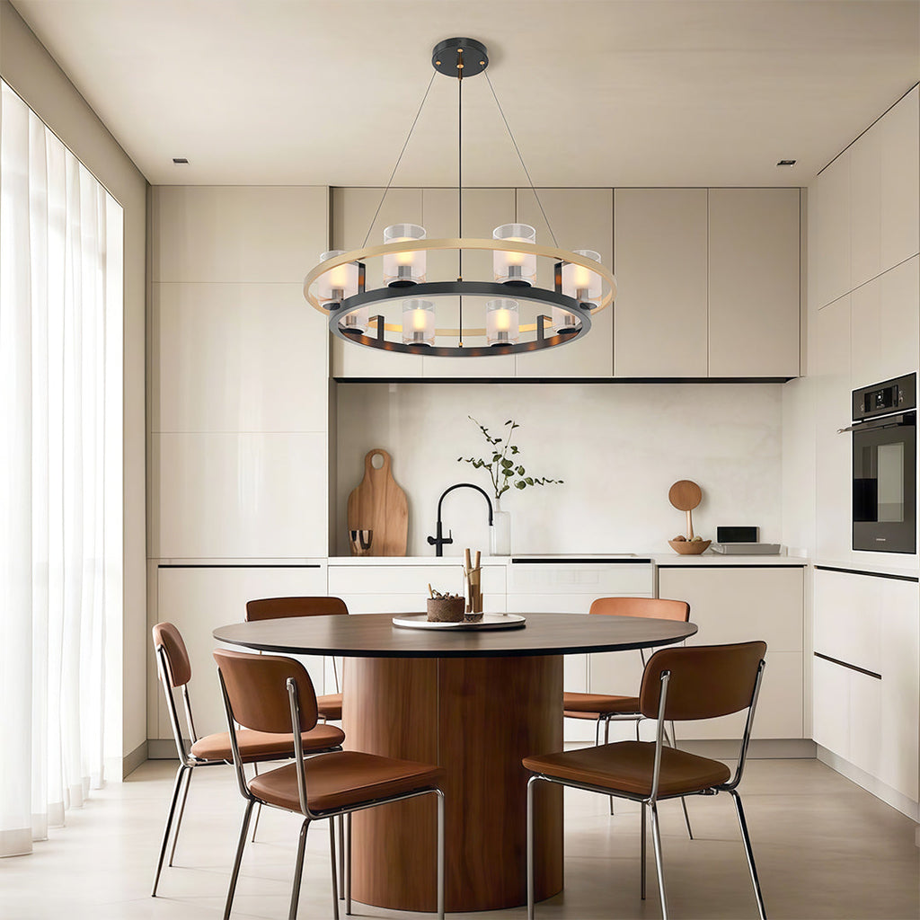 Wagon wheel chandelier over a round table in a minimalist kitchen