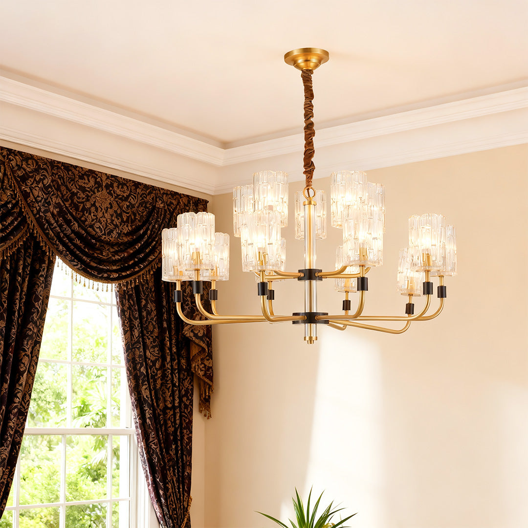 Cluster chandelier in an entryway with ornate curtains