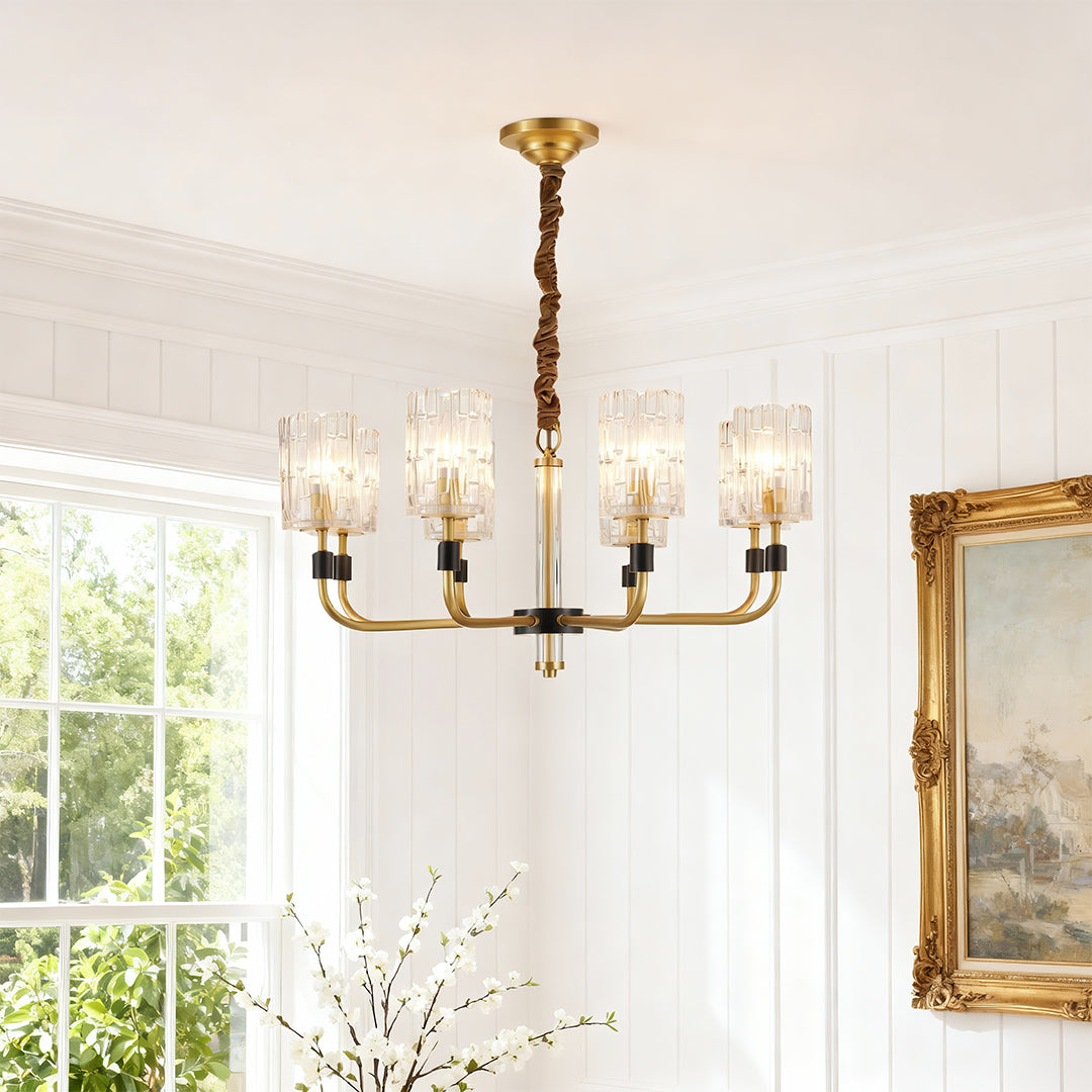 Cluster chandelier in a traditional living room with an arched window