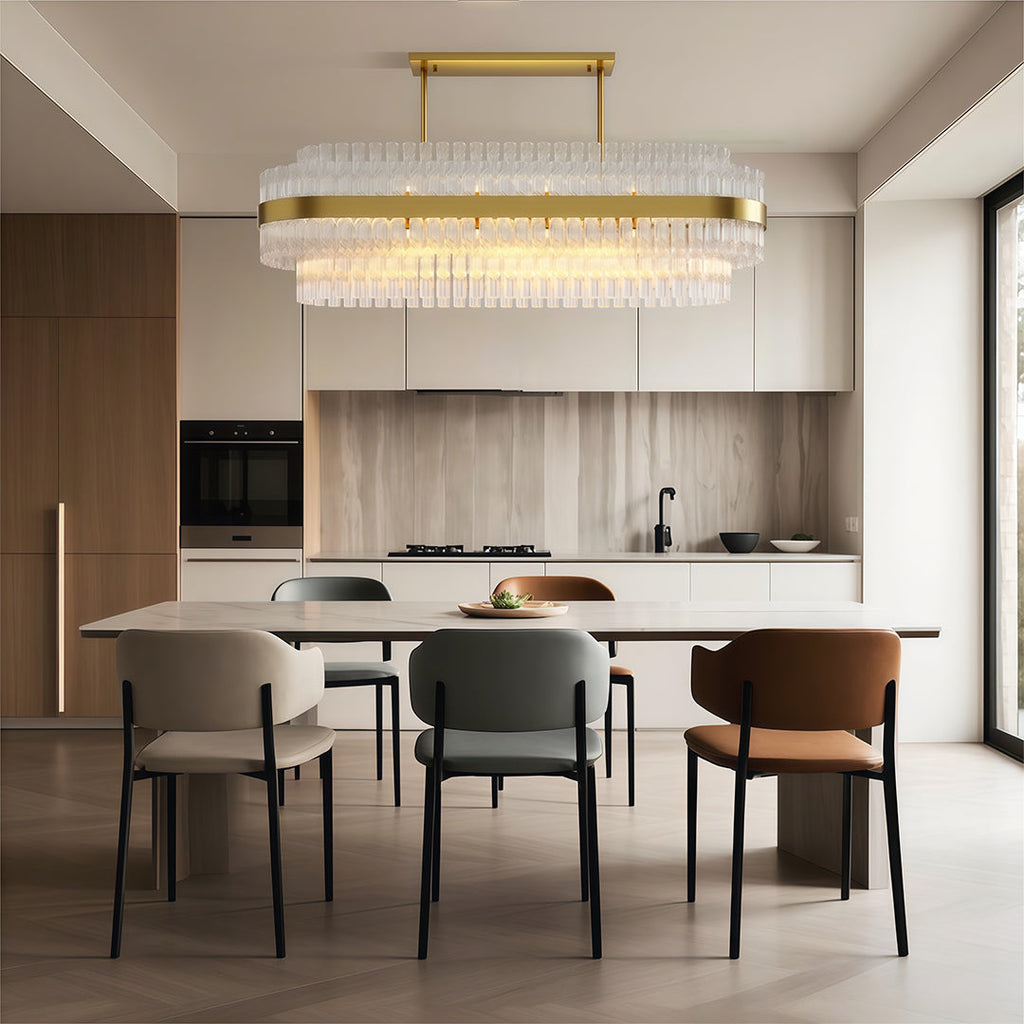 Industrial chandelier in a kitchen dining space in neutral tones