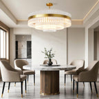 Industrial chandelier hanging above a round dining table