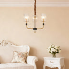 Cluster chandelier in a serene bedroom with white furniture
