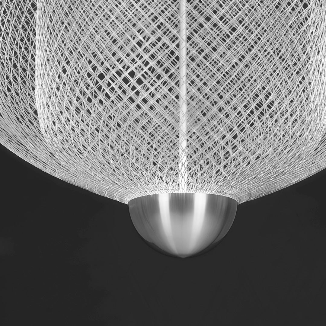 Macro detail of the woven silver wire texture of the shade