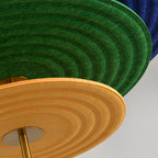 Macro view of the green and yellow felt texture