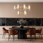 Gold metal chandelier in a sophisticated dining room