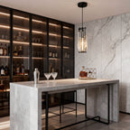 Mini crystal pendant light over a marble bar area