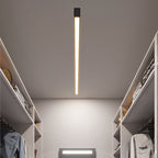 Minimalist linear ceiling light shown installed on a ceiling