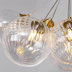 Gold bubble chandelier hanging in a bedroom