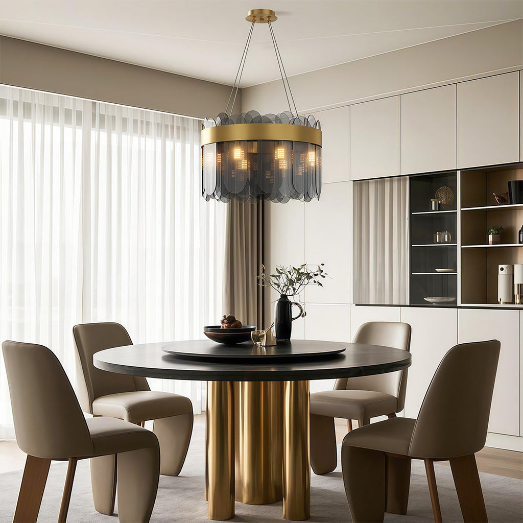 Ring chandelier hanging above a contemporary fluted table