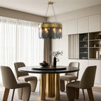 Ring chandelier hanging above a contemporary fluted table