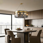Ring chandelier in a kitchen dining space with leather chairs