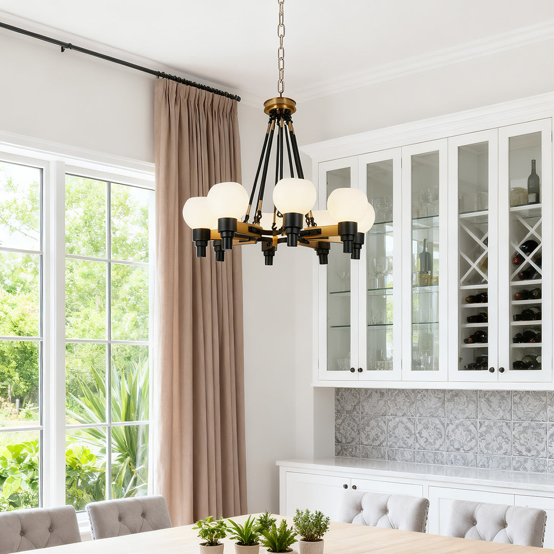 Dark bronze candelabra chandelier above a live edge table