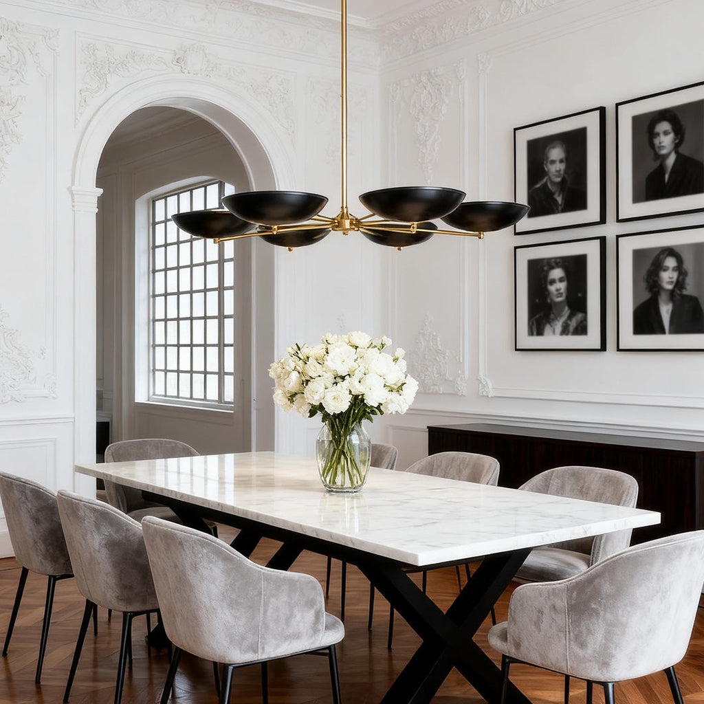 Five-light disc chandelier above a marble table in a formal room