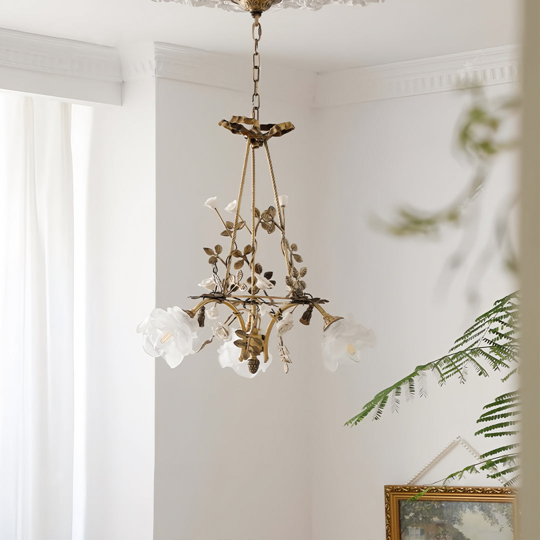 Flower chandelier hanging against serene white walls