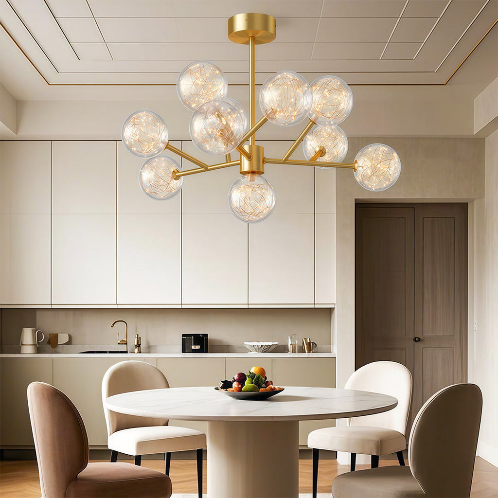 Globe chandelier above a round contemporary dining table