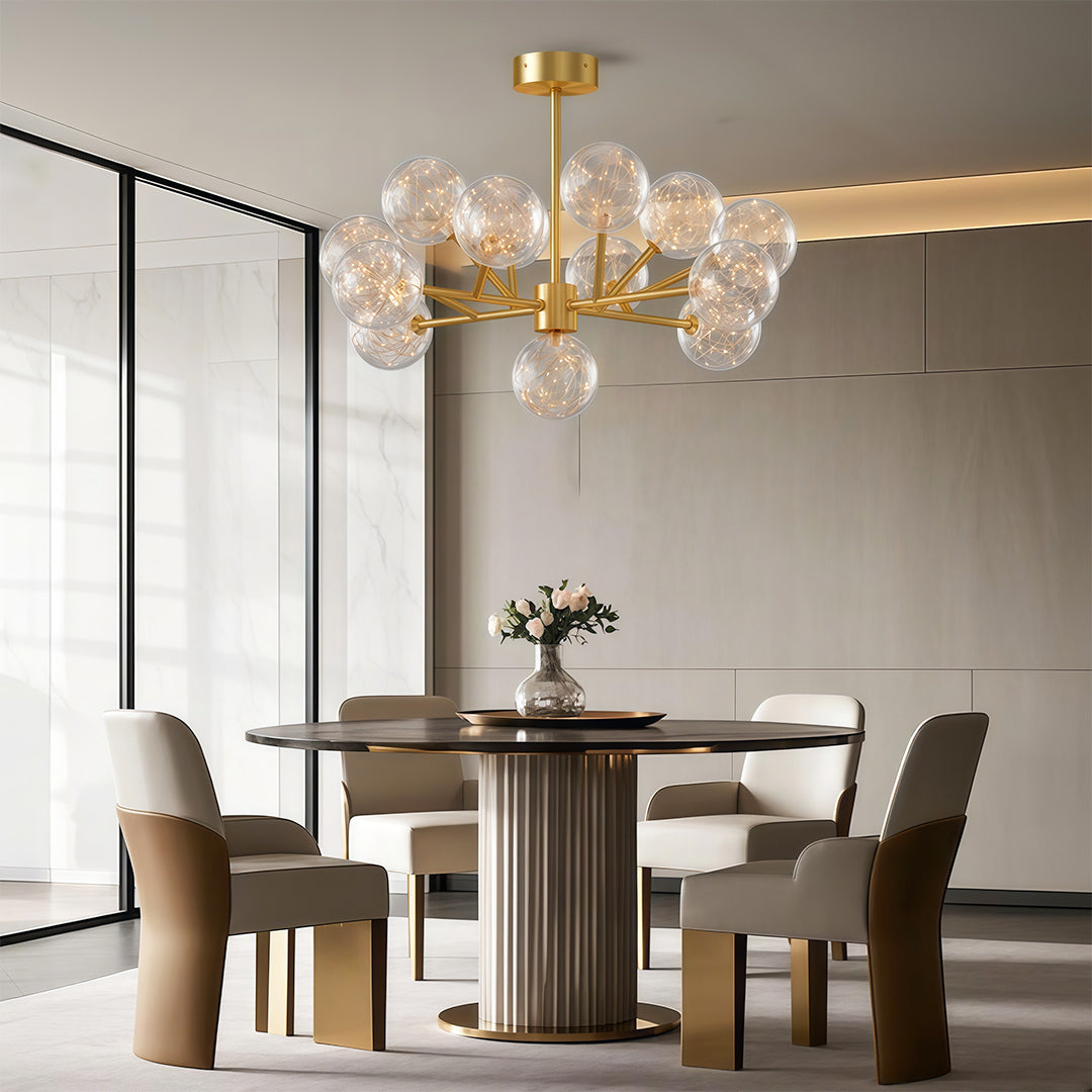 Globe chandelier above a fluted table in a neutral room