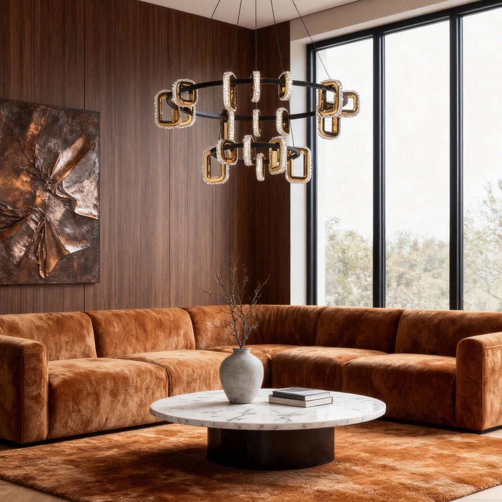 Gold chandelier in a wood panelled room with cognac leather