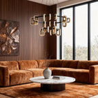 Gold chandelier in a wood panelled room with cognac leather