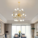 Gold sputnik chandelier hanging in a luxurious dining room