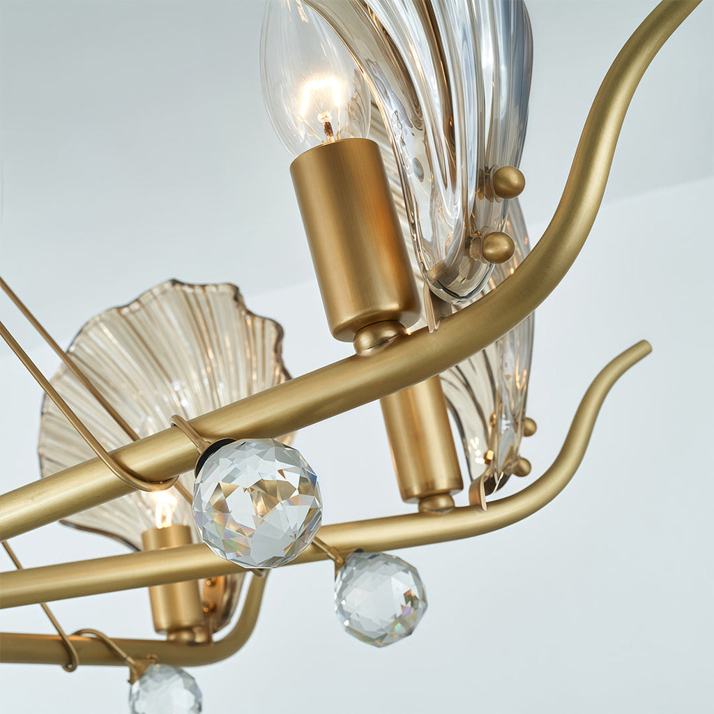Close-up of the brass and glass leaf shaped detail
