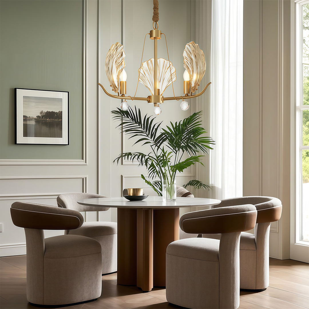 Chandelier above contemporary living room with leather sofas