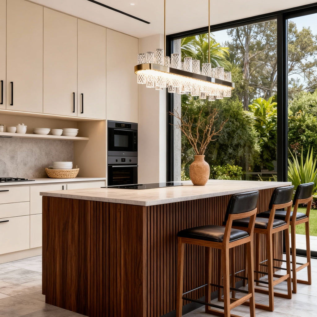 LED chandelier above a kitchen island with outdoor views