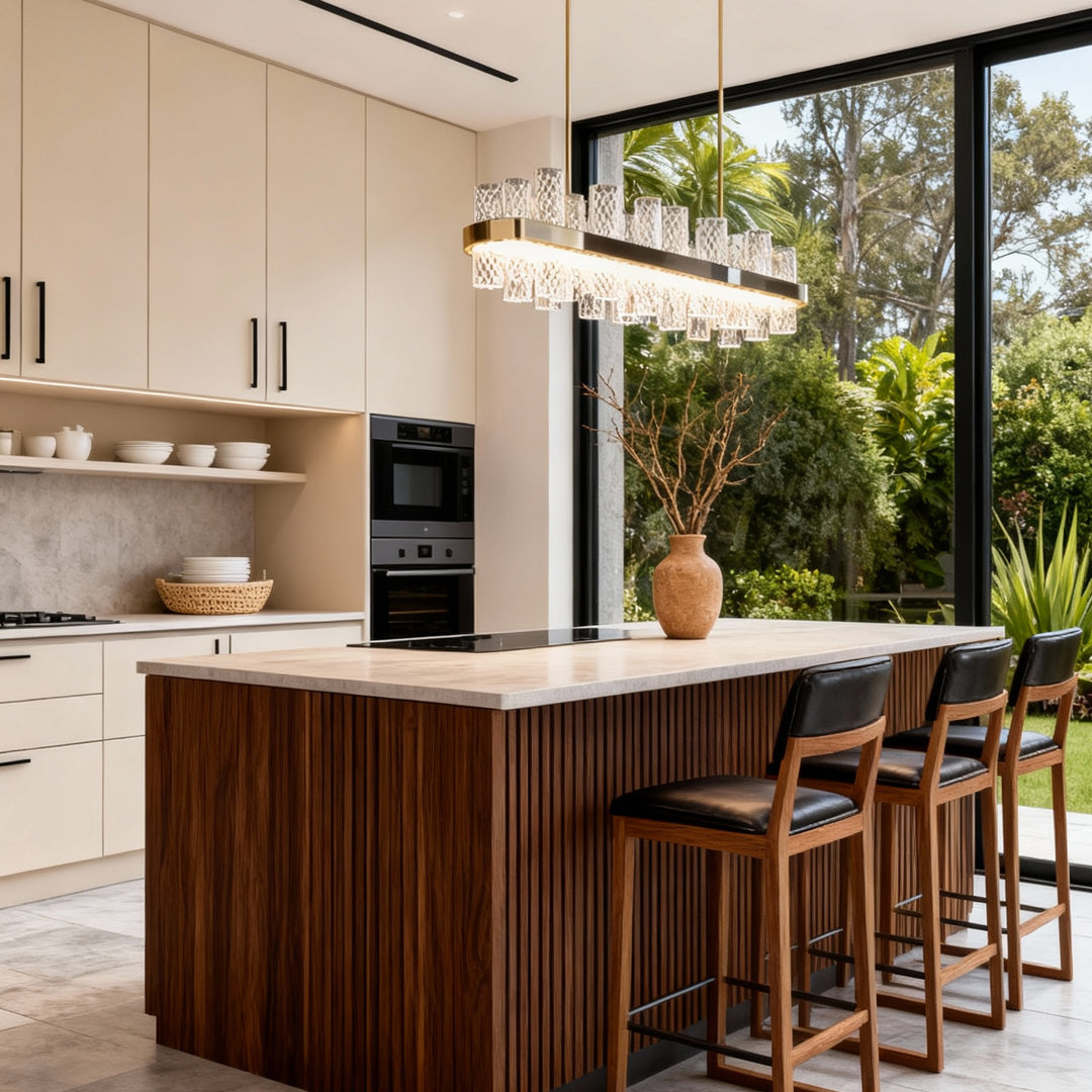 LED chandelier above a kitchen island with outdoor views