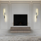 Linear wall sconce mounted on a fireplace wall