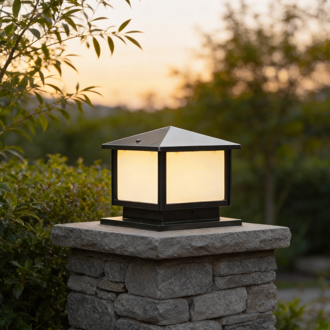 Modern pillar cap light on a stone column in a garden