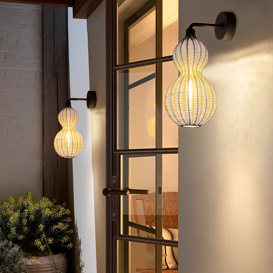 Rattan gourd pendant light mounted close against a wall