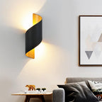 Black spiral LED wall light in a luxury indoor setting