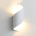 Spiral wall sconce as a decorative hallway light